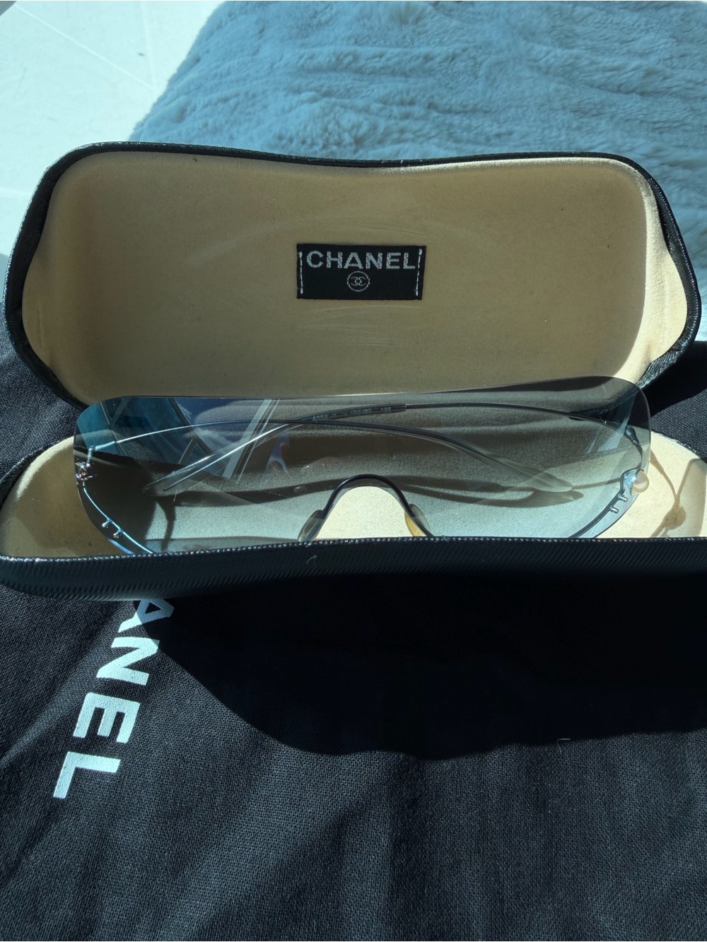 CHANEL Vintage Silver Rimless Sunglasses with blue lenses